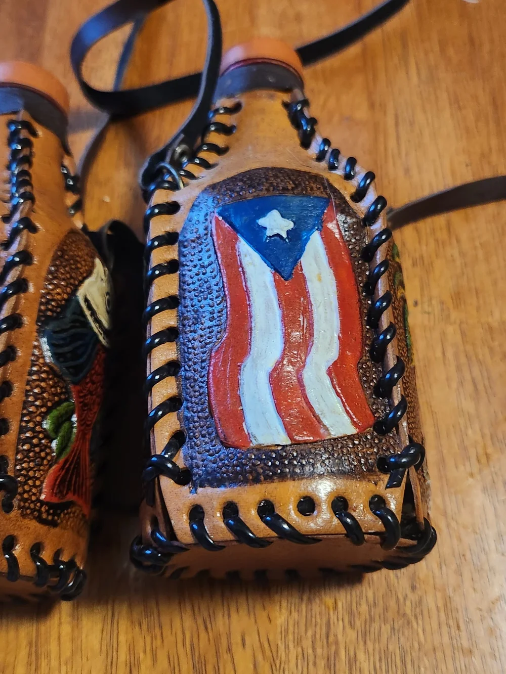 Handcrafted Leather Home Accent Bottle Covers in Brown with PR Flag Design